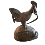 A cock killing a snake