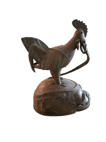 A cock killing a snake